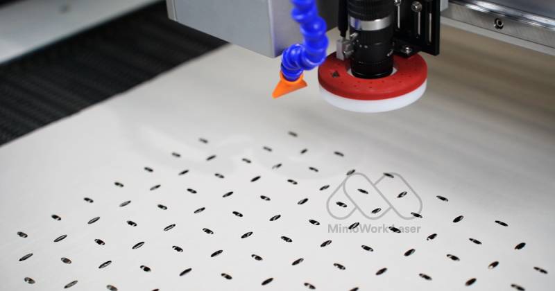 laser cutting holes in polyester fabric